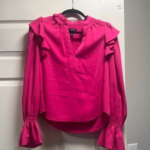 Aqua from Bloomingdale’s pink blouse